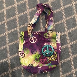 Small soft kids pocketbook with glitter peace sign